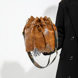 realaiot  Vintage Textured Bucket Bag, Tassel Decor Drawstring Shoulder Bag With Retro Pattern Strap