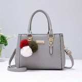 realaiot  Trendy Double Handle Satchel Bag, Pompom & Metal Decor Purse, Women's PU Leather Crossbody Bag